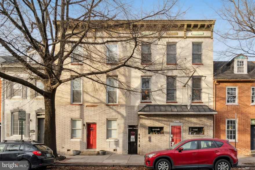 Multi-use Investment property with 6-day BWL license available in the heart of Fells Point.  Currently home to the Greyhound Tavern, this commercial property also features two rental units on the 2nd floor and one spacious rental unit with a private full bath on the 3rd floor.  The street level tavern features a  15 seat bar top, two bathrooms, and a large space plumbed for a Kitchen build out. Bar is leased separately, bar lease is currently up for renewal.  There is also private access to a shared courtyard.  Off the courtyard is a price entrance to the 2nd & 3rd floor apts. Two units on the 2nd floor share a large Kitchen and eat-in area, hallway full bath, and laundry room.  One of the units has an attached half bath.  3rd floor apt features hardwood floors, oversized private full bath, and walk-in closet.  Tavern and Rental units generate $3,585/month, although units are under market rent.  Tavern pays $1,875/mo, two units on the second floor pay $410/mo & $450/mo, 3rd floor unit $850/mo.  Plenty of room for growth for the right Buyer.  Same owner is selling neighboring property 1820 Fleet is also for sale, listed as a multi-unit.