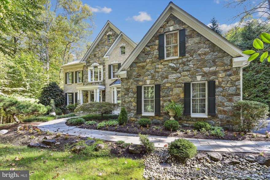 New  price! VA BUYERS- SELLER HAS ASSUMABLE 2.25% LOAN. Straight out of Beautiful Homes and gardens | Amazing Davidsonville property ...Meticulously maintained this Winchester built 4-5bedroom, 4.5-bathroom home in Davidsonville’s coveted Ashley neighborhood is nothing short of impeccable. Serenely surrounded by trees offering the utmost private tranquil setting. Ideally located within a community with the convenience of quick access to Rt. 50, and easy access to nearby shopping and area restaurants.  Professionally landscaped this 1-acre lot includes an in-ground heated saltwater pool with water fall feature, magnificent specimen tress  and over 7,000 sq ft of exquisitely finished living space, loaded with upgrades. This home boasts polished elegance, superior craftsmanship, sophisticated detail, and design-inspired features in every room! Hardwood floors, custom moldings, exquisite light fixtures, plantation wood shutters, soaring ceilings, and lofty windows enhance the common areas. The first floor features an office/study appointed with custom cherry-built ins, a large open dining room with a beverage service area and a gourmet custom kitchen featuring numerous windows overlooking the private backyard oasis.  Entertaining is made seamless with an oversized island, eat- in casual dining space, updated stainless appliances, a gas cooktop and a dedicated pantry. An impressive two-story family room featuring a soaring stone gas fireplace, formal living room, additional staircase, mudroom/drop area, and half bath complete the main level. The upper level offers a luxurious spacious primary suite , well-appointed with built in entertainment unit, sitting area fabulous garden views, and two walk-in , love the creative closet built-ins. Additional upper bedrooms include 2 large bedrooms with a Jack and Jill bath, a 4th bedroom with an ensuite bathroom, plus the convenience of 2nd floor laundry. Travel downstairs and the walk out basement could serve as a fabulous au pair suite with a full bath, large family recreation space,  a separate exercise room with closets could be perfect for guest room.  Additionally, the lower level boasts a spacious storage room/ utility room. The exterior is a complete private outside oasis and will satisfy all your entertaining desires with an expansive paver stone patio, accessed by the low maintenance trex deck.   Premium lot location backing to community preservation area and across the street, as well.  The exterior features extensive hardscaping w stone stair steps leading to the shed, native landscaping surrounding the beautiful waterfall pool, exterior lighting, a playset for the little ones and fenced backyard surrounded by nature!  All in all, this home is truly a must-see for anyone who appreciates luxury living at its best! Blue Ribbon Davidsonville School!
Its time to escape to a secluded haven right in your own home, unwind in a peaceful setting filled with the tranquil sound of the waterfall and chirping birds.  Enjoy the warm months ahead while relaxing by the heated pool,  surrounded by  the  picturesque gardens and  scenery. An idyllic retreat for hosting memorable  family gatherings and friendly get togethers.