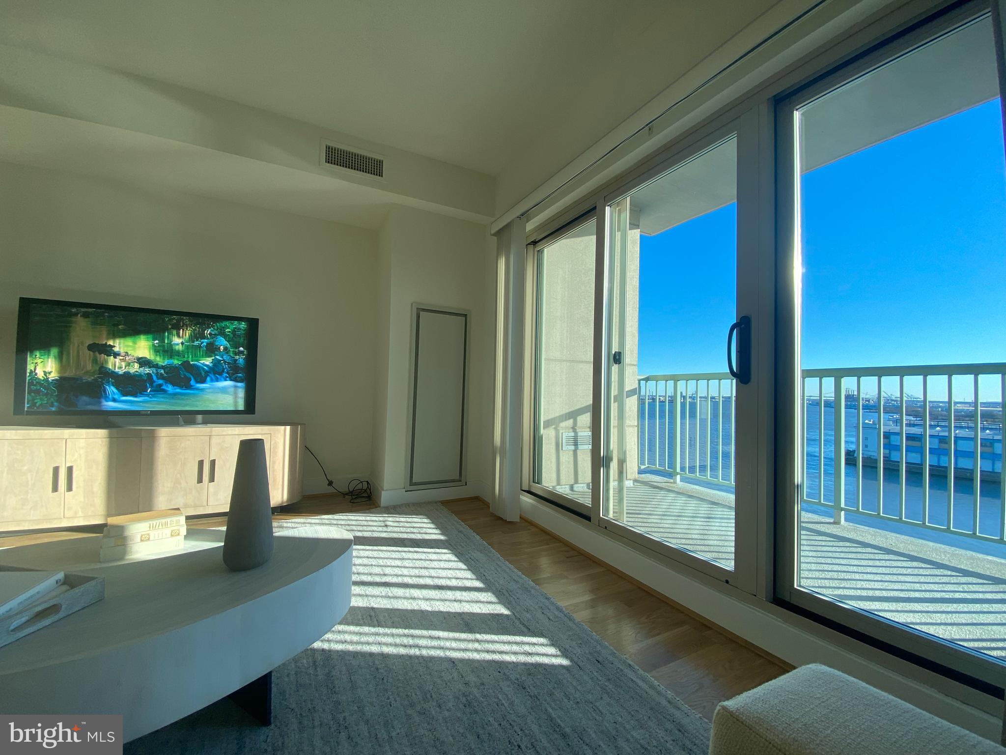 Unit 1610- with 30 Day Delivery ! Sunny South Facing Unit, high floor, with a beautiful water view from the 16th floor, this Ranger floor plan, offer an formal entry to welcome your guest, with brand New Hardwood Floors, New Stainless Steel Appliances, New Carpet in both bedrooms and closets, plus Freshly Painted. This is MOVE IN READY! The quality features at The Residences at Dockside include huge windows framing extraordinary city and river views, spacious walk-in closets, well appointed designer kitchens, wired for high-speed and internet access. The amenities and conveniences that accompany Dockside include three levels of indoor parking space with security-gated access, one reserved parking space for each Dockside resident elegant lobby w/24 concierge, health and fitness facility, heated indoor swimming pool and hot tub, spacious community/entertainment room with party kitchen, big screen TV, surround sound system and expansive terrace with remarkable views.
Shown By Appointment Only Appointments are not accepted via showing time.