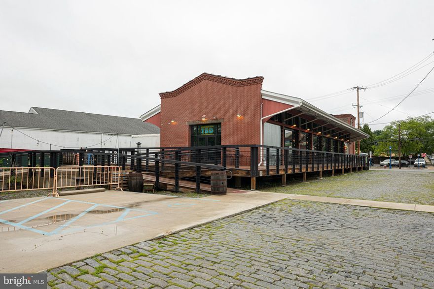 Amazing Opportunity in Downtown Phoenixville! This amazing property is situated directly on Bridge Street in Phoenixville.  Constructed in the early 1900's and renovated in 2020, this building once served as a freight depot for the "Pickering Valley Railroad" - such history!  5,190 sq ft of prime commercial space on just under 1 acre — a rare gem in one of the most vibrant towns around! 45 private parking spaces, Beautiful expansive exterior space, modern updated interior & situated beside a highly anticipated storefront/apartment development.  With fantastic visibility, high foot traffic, and a thriving community, this location is ideal for your next venture. What amazing business will YOU thrive in here? Upscale restaurant? Trendy brewery? Wellness studio? Boutique market? Music Venue? Golf Simulator?  Endless possibilities!  Don’t miss your chance to own in the heart of Downtown Phoenixville!