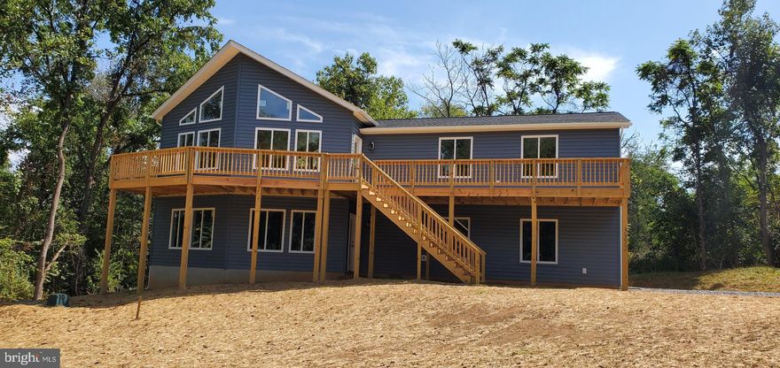 Construction Will Start With Contract!  All The Upgrades, Bells & Whistles! 6 Additional Feet Added To Plan, Vaulted Ceilings, Vinyl Plank Flooring, Carpet In Bedrooms, Open Floor Plan With Great Room Opening To The Kitchen, Great For Entertaining. Granite Counter Tops, Stainless Steel Appliances. Master Suite, Upgraded Tiled Luxury Bath, Over-sized Tub & Separate Shower With Walk In Closet. Full Basement With Lots of Natural Light with 2 Car Garage. Enjoy Full Length Front Porch & Rear Deck. Enjoy Large Lot .65 Of An  Acre.  Easy Access to I-66, Perfect For Commuters. Select Your Colors, Local Builders Flexible & Easy To Work With.   Comcast High Speed Internet Available. 10K Non Refundable Deposit Required.   Upgrades Paid Up Front To Seller & Are Non Refundable.  Enjoy Shenandoah Shores With Access to the Shenandoah River, & Common Areas. 10K Non Refundable Deposit Required. Upgrades Paid Up Front To Seller & Are Non Refundable For Any Reason. Property Is Located In A Sanitary District & POA Fees Are Paid With Real Estate Taxes. 1 Year Warranty Backed By DPOR