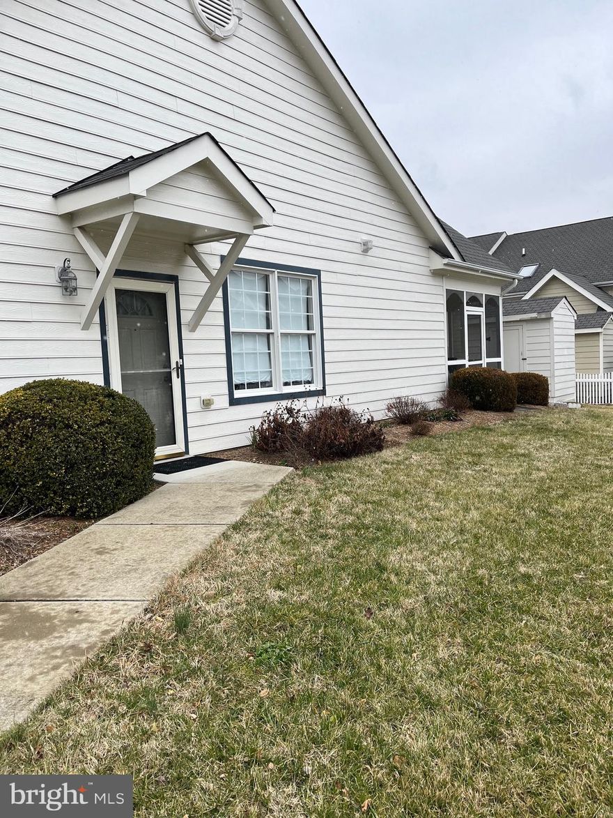 Located in the town of LaPlata close to food stores, restaurants and shopping.  This senior community offers lawn maintenance, mulching, window washing, trash pick up, community center (in walking distance) and roof maintenance.  Move in ready so hurry and see this home before it is sold.  The homes move quickly in this neighborhood.   This home has laminate floors in living area and carpet in bedrooms. The laundry room has built in shelves that can store groceries and be used as a pantry.  Enjoy your morning coffee on the screened in porch.  Store your tools and other items in  the shed. Must see just show and sell