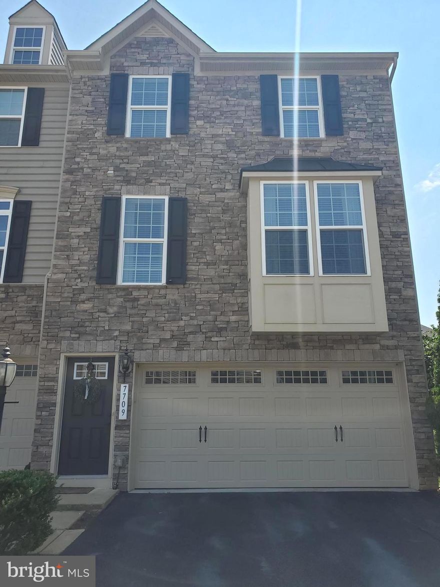 Available September 1st – Luxury End-Unit Townhome in Gainesville!

Don’t miss this beautifully maintained, end-unit townhome built by Ryan Homes. Offering three spacious levels and an open-concept layout, this home is perfect for modern living.

The main level features a bright and inviting family room, a stunning kitchen with granite countertops, stainless steel appliances, a large island ideal for entertaining, and hardwood flooring througout. A convenient half bath completes the main level.

Upstairs, you’ll find three generously sized bedrooms and two full bathrooms, including a spacious primary suite with a large walk-in closet, private bath, a his and hers granite vanity, and tile flooring.

The fully finished lower level includes an additional full bathroom and opens to a private backyard backing to a wooded common area with a patio which is perfect for relaxing or entertaining outdoors.

Additional features include a 2-car garage with extra storage and ample guest parking in front. Enjoy walking trails and close proximity to Lifetime Fitness, shops, dining, and entertainment at Atlas Walk. Commuting is easy with quick access to I-66 and the nearby University Boulevard Park & Ride, offering OmniRide commuter bus service.

Each adult applicant must have a minimum credit score of 660.