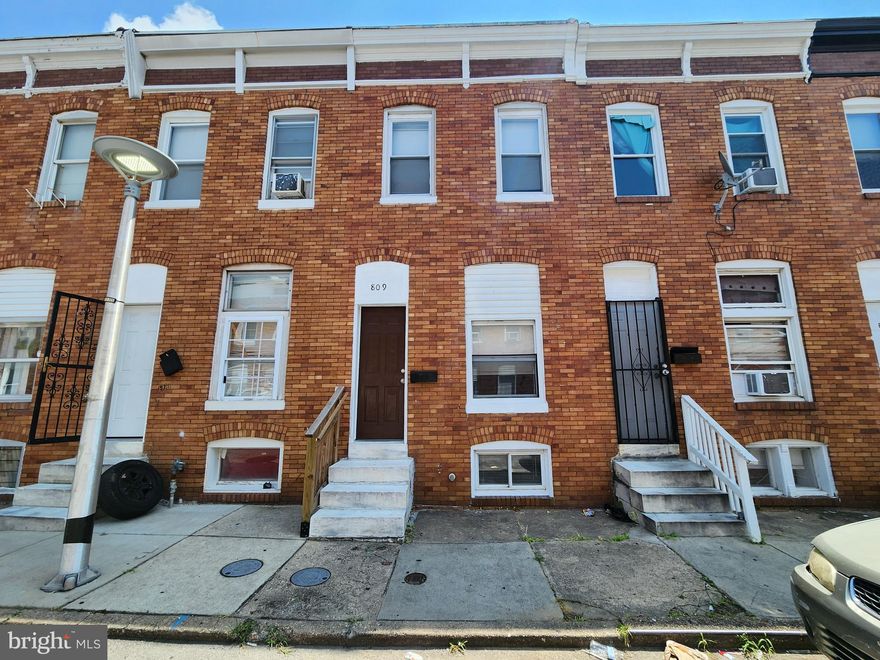 ONLINE AUCTION: Bidding begins 11/5/2025 @ 11:00 AM. Bidding ends 11/7/2025 @ 11:40 AM. List Price is Suggested Opening Bid. Deposit: $7,500.

809 N Curley St is a two-story rowhome located in Baltimore’s Madison-Eastend neighborhood.
It’s +/- 1 mile from Patterson Park and Johns Hopkins Hospital. Major traffic arteries nearby include E Monument Street, Orleans Street (U.S. Route 40), and Pulaski Highway.
This turnkey rental property features a current lead certificate, an updated electrical panel, fresh paint, and recently serviced appliances and furnace.