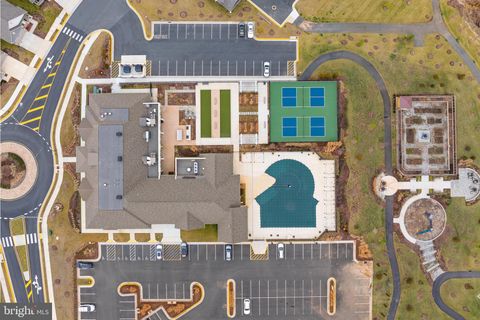 Photo of 21630 Hawksbill High Circle #204, STERLING, VA 20164 (MLS # VALO2101016)