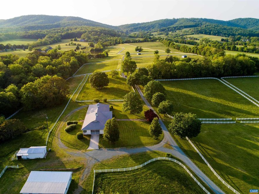 60+/- private acres of rolling open minutes to town, across from Keswick Hall.  A beautiful parcel with panoramic views of the SW Mountains and surrounding farms.  The property comes with three development rights and is a strong candidate for a conservation easement.  Excellent infrastructure including a small farm house, center aisle stable, pony barn, multiple paddocks and run-in sheds, riding ring and a good road system. Numerous exceptional building sites.