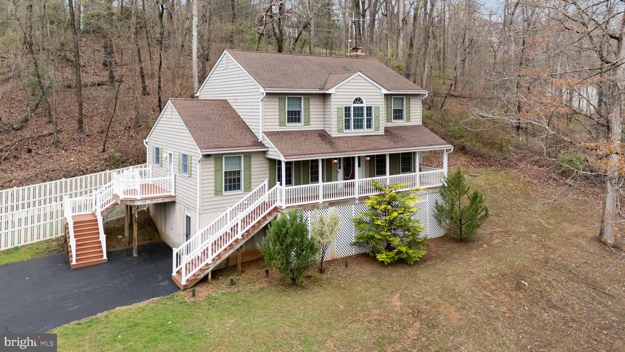 Experience peace and tranquility on a private 0.85 acre setting in the quaint town of Pylesville. On your covered front porch you will enjoy the calm sound of water rolling down the adjacent creek and the beauty of the local birds flying from tree to tree. Appreciate mother nature in a way that is not possible in the City! This 4 bedroom, 2.5 bath raised colonial was custom built and has been lovingly cared for since 1994. Enjoy an expansive kitchen with stainless steel appliances, a dedicated pantry and an eat-in breakfast area.  Entertain in the formal dining room or in front of the family room’s pellet stove. A formal living room, powder room and spacious laundry room round out the main level.  Upstairs you will love the primary suite, featuring two closets, a private reading or office nook, and an exclusive ensuite bathroom.  Three additional bedrooms and a full bathroom in the hallway offer space for everyone else. The unfinished basement offers full-height ceilings and rough-in plumbing, and is the perfect blank slate to add over 1,000 sqft of living space when you’re ready. Until then, enjoy limitless storage, space for a home gym, or a play area. The home has been freshly painted and is ready for the new owner to move right in. Many of the big ticket items have already been done for you: architectural shingle roof replaced in 2020 and AC replaced in 2018. Gutter guards, composite decking and vinyl fencing limit your time spent on maintenance so you can enjoy the wonderful outdoors. Parking for numerous vehicles and a fully fenced backyard perfect for your four-legged friends! Large shed and under-porch storage areas. Close to PA, Norrisville, Jarretsville and Bel Air. Only 15 minutes to I-83 and 45 minutes to Baltimore. Come take a look before it’s too late!