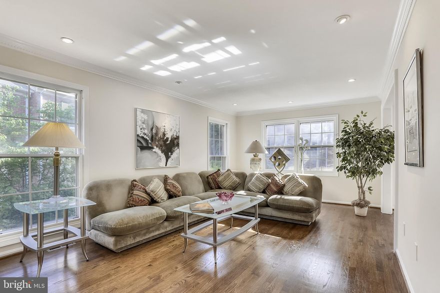 Lovely!  Come see this renovated 4 bedroom, 3.5 bath brick end unit townhome in a quiet courtyard setting overlooking flowers and trees.  Entire interior freshly painted in neutral color and hardwoods on main and bedroom levels have just been refinished.  Kitchen with stainless appliances, white cabinetry and granite countertops, light filled dining and living room with recessed lights and natural lighting, gracious foyer entry with large closet, king-size primary bedroom with beautiful updated bath, walk in closet plus second closet, updated hall bath, 2 additional spacious bedrooms with excellent closet space; walk out lower level with fireplace, family room, 4th bedroom, full bath, great storage and separate laundry room.  25 year roof installed 2007; HVAC new 2010; Best location!  Close to major transportation routes and Grosvenor Metro,  all amenities including Montgomery Mall, Cabin John Park with ice skating and racquet ball, Locust Grove Nature Center, Home Depot; Minutes to Cabin John and  Georgetown Square Shopping. Community amenities include pool, tennis and 3 parking passes (unassigned).  Top rated MCPS school district.  Any offers we receive will be reviewed on Tuesday, June 8th.