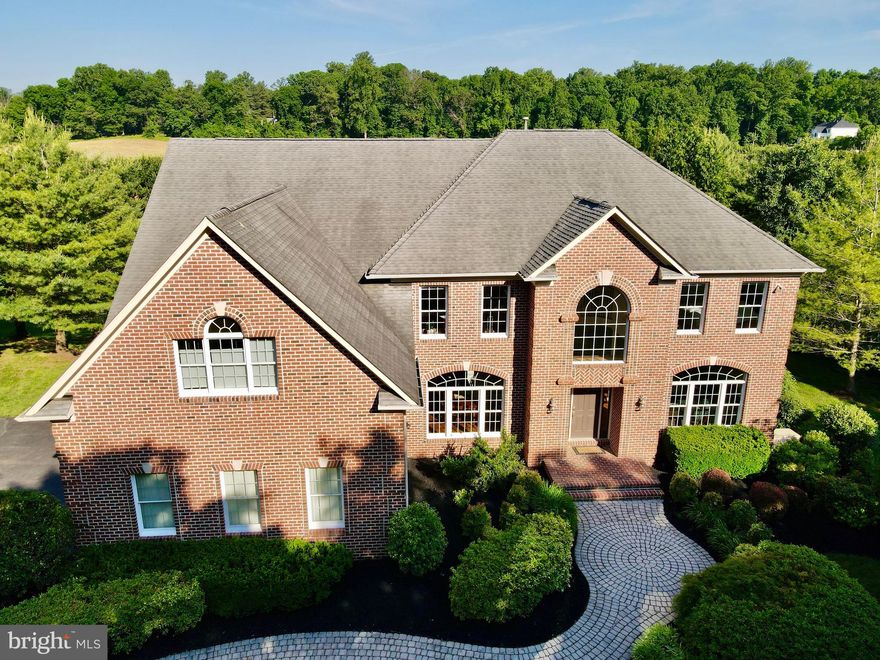 **Check Out Video Tour of the Property** Welcome to 11636 Quarterfield Drive! This elegant all-brick colonial is situated on a 1-acre lot, boasting a backyard that is perfect for hosting your family and friends. As you step into the home, the grand 2-story foyer bathes the space in natural light, creating a welcoming ambiance. To the right of the foyer, you'll find the formal living room, an inviting space where you can curl up with a book and enjoy a cup of coffee or tea as you start your mornings. Adjacent to the living room is the formal dining room, conveniently located near the kitchen, making it ideal for hosting family get-togethers and holiday events. For those in need of a dedicated workspace, the main level features a private study, offering the perfect setting for your home office needs. Continuing through the main level, you'll be captivated by the grand open concept family room, featuring a gas fireplace and floor-to-ceiling windows that provide stunning views of the backyard oasis and pool. The kitchen is a true delight, equipped with gas cooking, granite counters, a two-tier island with bar stools, and a walkout to the tiered deck, pergola, and breathtaking sunset views. Whether you're preparing a gourmet meal or enjoying a quick bite, this kitchen offers both functionality and style. As you make your way upstairs, the owner's suite awaits, offering a tranquil retreat. This spacious suite boasts three separate closets, including two walk-in closets, allowing for ample storage space. From the owner's suite, you can admire the manicured pool and yard, and the private bath provides the ultimate spa-like experience with its separate vanities, walk-in glass shower, and jetted soaking tub. Convenience is key, as you'll find a washer and dryer conveniently located just outside the owner's suite. Additionally, there are two full baths and three bedrooms on the upper level, ensuring comfortable accommodations for everyone. The lower level of this home is designed for entertainment and relaxation. Here, you'll discover a huge recreation room, complete with a wet bar and a theater room, perfect for hosting movie nights or game day gatherings. The lower level also features a full bath, two additional bedrooms, a second laundry room, and a walkout to the concrete patio. Welcome to paradise! Step outside to your own private oasis, where an in-ground pool awaits. Surrounded by beautiful and private landscaping, this pool area will make you feel like you're on a permanent vacation. The owners have gone the extra mile by planting several fruit trees in the backyard, including peach, cherry, plum, pear, apple, and fig trees, adding a touch of nature's bounty to this already enchanting property. Don't miss out on the opportunity to own this stunning home. Contact us to schedule a tour!