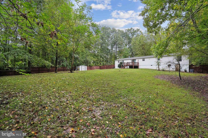 Beautiful four bedroom, two full bathroom home nestled into the countryside on two wonderfully wooded acres. As you enter this home you will find a large master bedroom to the right with the other 3 bedrooms on the other side of the home down the hallway.  The master bedroom features a master bath, closet and BONUS ROOM! Bonus room could be used as walk-in closet, storage or even a nursery. To your left you will find an adorable formal dining room or potential office. This home has a spacious living room that features a fireplace to snuggle around during the winter months while sipping on your hot cocoa. Enjoy the peaceful tranquility of nature from your back deck as you gaze into your large fully fenced backyard. Perfect for all your summer gatherings, let the dogs run freely or the children play. This backyard also features a nice storage shed to hold all your lawn and garden tools. The homes roof is also only two years old! Work from home or stream away with Firefly High Speed Internet! You will also find ample parking with its freshly re-graveled driveway! Home sits on the Fluvanna and Louisa County Line,  MLS states Louisa County Public Schools but public records state Fluvanna County Public Schools. (Taxes paid to Fluvanna County) *UPDATE* NEW  Runtru HVAC System Installed 02/09/2025 INCLUDES a 5 Year Warranty! This home is conveniently located minutes from I-64, 10 mins to Zion Crossroads, 25mins to Charlottesville, 20mins to Louisa and only 14mins to Palmyra.
(Roof and Heat Pump replaced 2022)