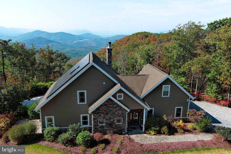 PRIVATE MOUNTAIN OASIS. ELEVATED AT 2600 FT ON THE SOUTHERN SLOPE OF SOUTH BRANCH MOUNTAIN, THIS STUNNING ESTATE OFFERS UNPARALLELED MOUNTAIN VIEWS AND SUNSETS SO SPECIAL IT SHOULD BE A SIN! CUSTOM BUILT IN 2016 WITH ENTERTAINMENT IN MIND..... INSIDE AND OUT. ON THE MAIN LEVEL YOU'LL FIND A GOURMET KITCHEN, GREAT ROOM WITH HUGE WOOD BURING FIREPLACE AND AN ALL SEASON ROOM TO SOAK IN THE VIEWS 24/7 365. THE UPPER LEVEL OFFERS 3 BEDROOMS AND ADDITIONAL LIVING ROOM FOR GUESTS TO CONGREGATE. THE BASEMENT OFFERS A MASSIVE BAR AREA SURE TO KEEP GUESTS HAPPY AND A FULL BATH CONVENIENT TO THE POOL. 16X32 HEATED SALTWATER GUNITE POOL WITH AUTOMATIC COVER FOR EASY MAINTENANCE. INCREDIBLE OUTDOOR LIVING SPACE AROUND THE POOL AND OFF THE MAIN LEVEL, SEE THROUGH FIREPLACE ON THE BACK DECK TO KEEP WARM WHILE STAR GAZING. PLENTY OF ROOM FOR YOUR TOYS & HOBBIES, 24X26 ATTACHED 2 CAR GARAGE AND 24X24 2 CAR DETACHED GARAGE. THE LIGHTS NEVER GO OUT....GRID TIED SOLAR AND WHOLE HOUSE GENERATOR.....WORK REMOTELY WITH FIBER INTERNET VIA HARDYNET. THIS HOME IS FULL OF TOO MANY UPGRADES TO LIST, YOU MUST SEE TO APPRECIATE. THE LOCATION....EASY TO GET TO BUT HARD TO FIND....ONLY 2 MILES OFF THE PAVED ROAD, 4 MILES OFF 4 LANE SUPER HIGHWAY, 20 MINUTES FROM MOOREFIELD, 50 MINUTES FROM SKI RESORTS & WINCHESTER, VA AND AN EASY & BEAUTIFUL 2 HOUR DRIVE FROM NORTHERN VIRGINIA. THE ULTIMATE WEEKEND DECOMPRESSION ESCAPE ZONE, ENTERTAINMENT HUB FOR ENVIOUS FRIENDS, LEGACY PROPERTY OR YOUR FULL TIME MOUNTAINEER SPREAD. YOU CAN'T TAKE IT WITH YOU! HAVE YOU EVER SEEN A HEARSE WITH A LUGGAGE RACK? TREAT YOURSELF TO SOMETHING SPECIAL, COME TOUCH THE SKY IN ALMOST HEAVEN!