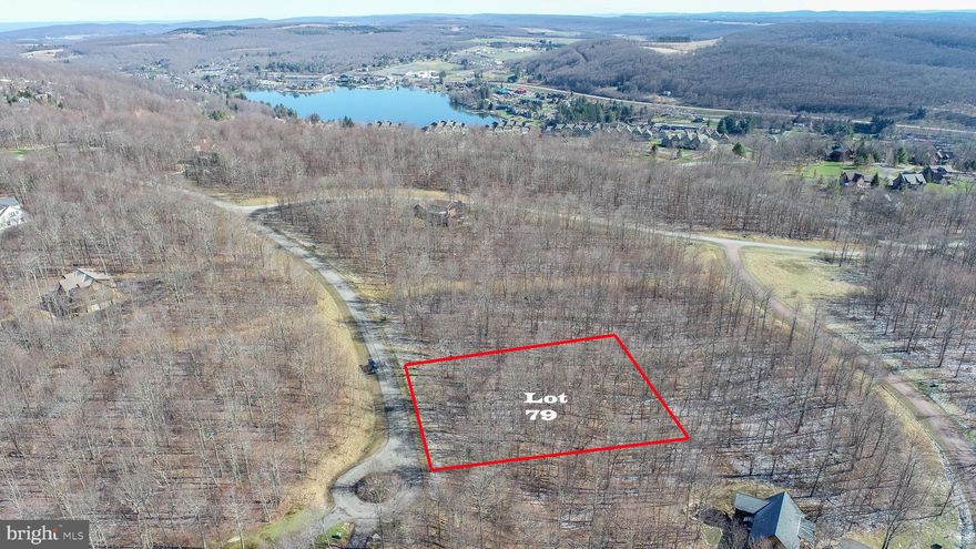 0.57 acre mountaintop homesite at Deep Creek Lake! Competitively priced and ready to build. This property offers location just minutes from Wisp, ASCI and all of Deep Creek Lake's amenities with a private feel towards the end of the cup-de-sac. Public water and sewer taps are paid, providing several thousand dollars in savings for a purchaser.  Electricity is to site. The only thing missing is your dream mountain getaway home!