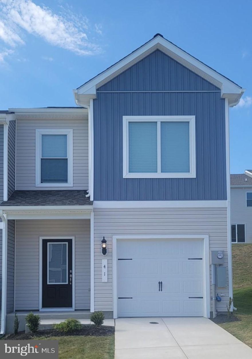 The Robertson is a spacious and modern 3-bedroom, 2.5-bath townhome from LGI Homes at Homeplace at Riverside in Falling Waters. Enjoy all the benefits of homeownership with the Robertson, which offers an open entertaining area on the main level, where your family will enjoy a chef-ready kitchen featuring an island and stainless steel appliances, as well as a spacious family room and dining area. Upstairs, retreat to the incredible owners suite where you will find enough space for a king-sized bedroom suite and a luxurious bathroom with a soaker tub and separate shower. Two more generously sized bedrooms, a second full bath and a laundry room provide the additional space you desire upstairs. Homeplace at Riverside offers gorgeous new homes and a peaceful, relaxed lifestyle with a neighborhood park, playground, picnic area and walking trails. The community's serene setting near I-81 positions you for easy access to big-city amenities in Baltimore or Washington D.C. as well as nearby shops, restaurants, schools and parks.