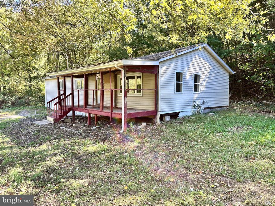 Newly updated 4-bedroom one bath in a quaint location.