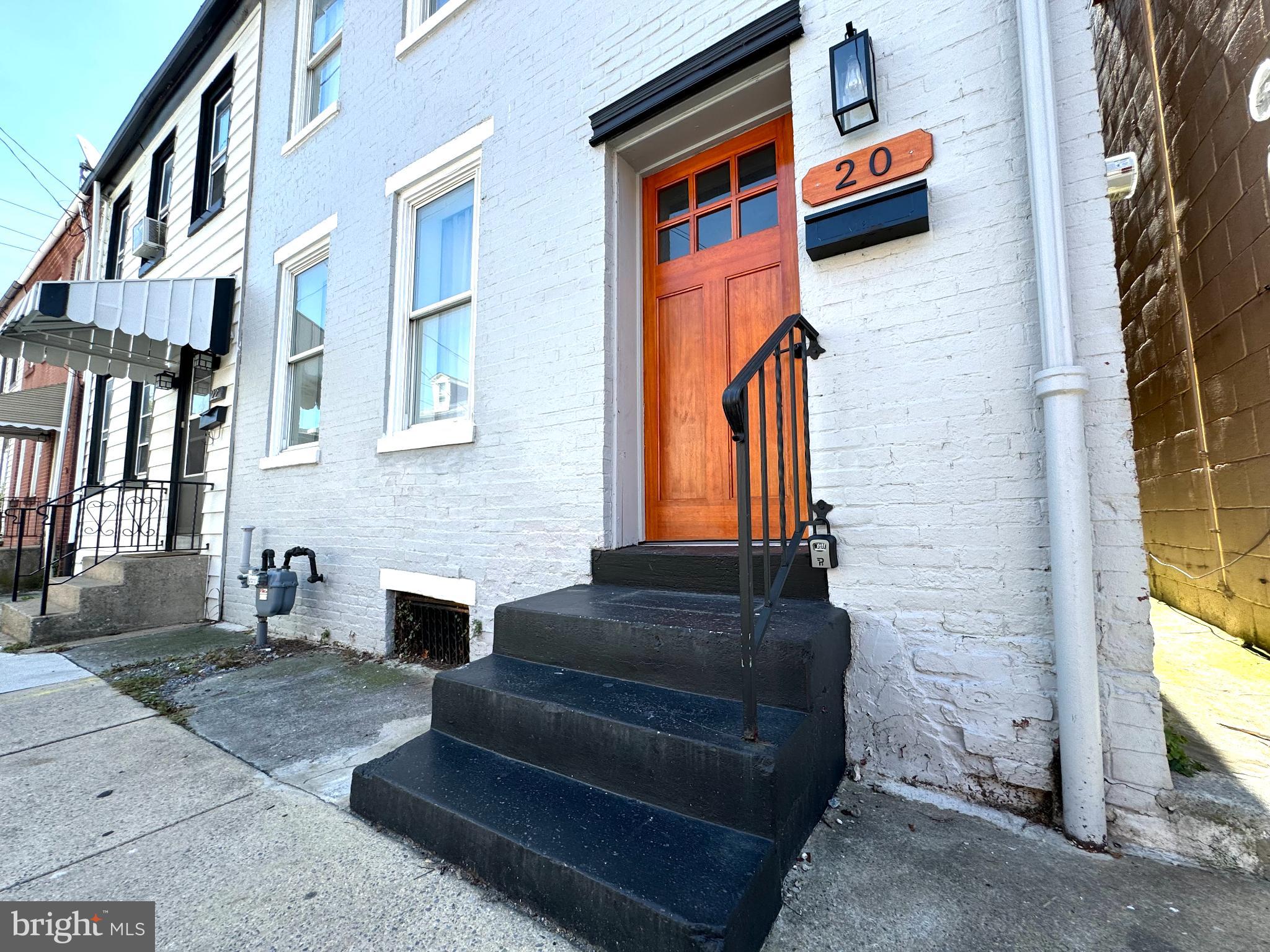 Nestled in the heart of the vibrant Stadium District, this exquisite 2-bedroom, 2-bathroom townhouse offers a perfect blend of historic charm and modern luxury. Originally built in 1883 and beautifully renovated in 2021, the property showcases a stunning Colonial and Traditional architectural style, featuring durable block construction and an excellent condition throughout. Step outside to enjoy the inviting enclosed patio, perfect for morning coffee or evening relaxation. The home is equipped with high-end appliances, including a gas oven/range, built-in microwave, and a stacked washer/dryer for ultimate convenience. With a prime location, you'll appreciate the serene atmosphere while being just moments away from local amenities. On-street parking adds to the ease of living here. Available for lease starting September 1, 2025, this property invites you to experience an exclusive lifestyle in a truly remarkable setting. Don't miss the opportunity to call this luxurious townhouse your home!