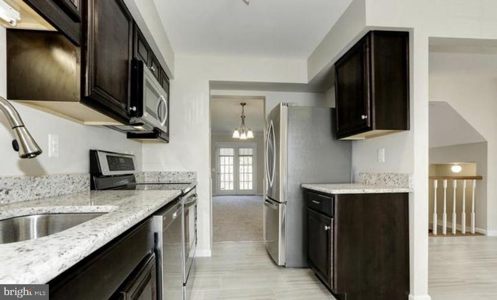 Photo of 613 Concerto Lane, SILVER SPRING, MD 20901 (MLS # MDMC2204856)