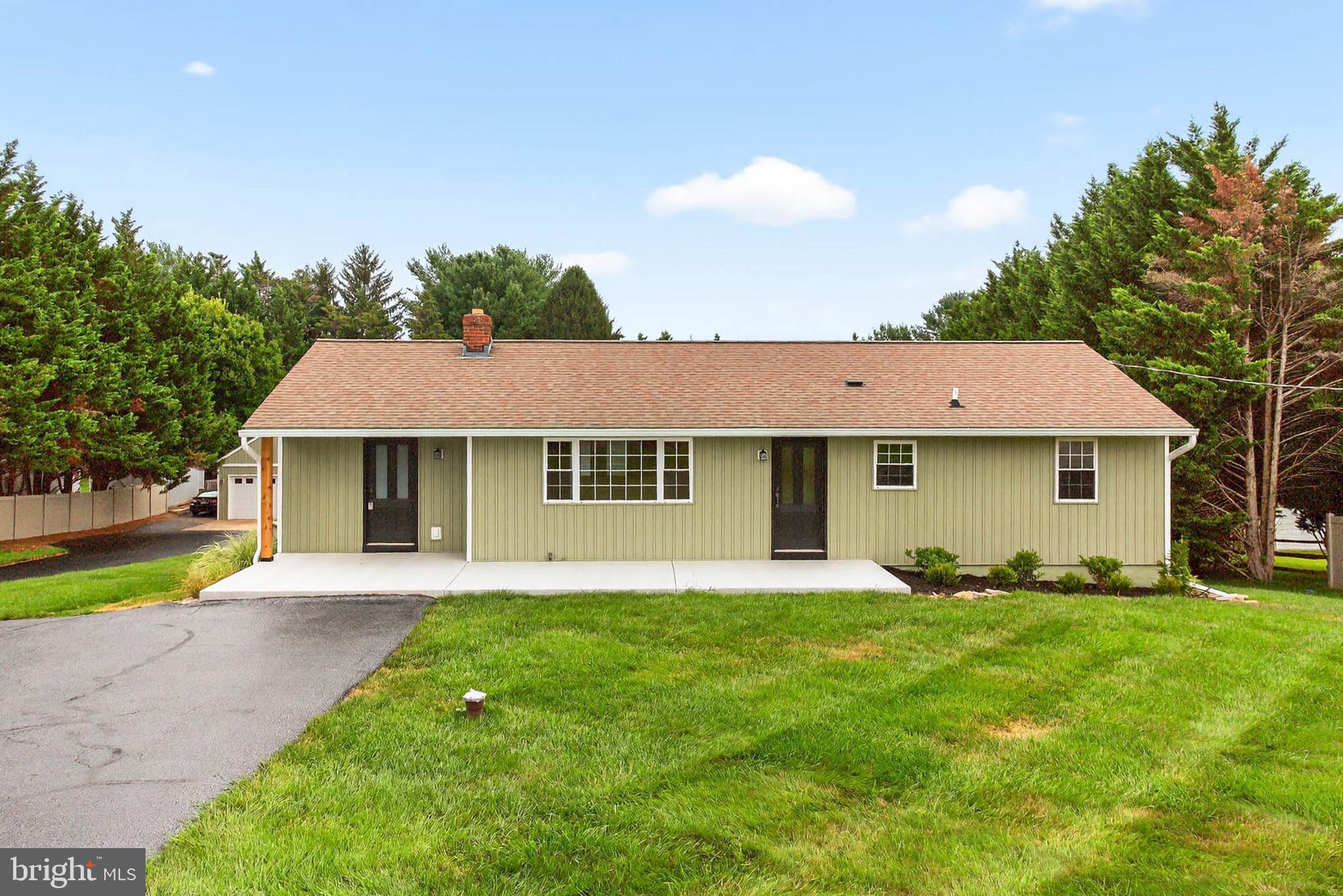 Welcome to this beautifully updated ranch home that seamlessly blends classic charm with modern upgrades and generous outdoor amenities. Built in 1965 and set on a spacious 1.04-acre lot, this home offers approximately 1,260 square feet of finished living space above grade, plus a fully finished walk-out lower level. The flexible layout features four bedrooms, three on the main level and one in a private in-law or au pair suite downstairs...along with two full bathrooms. Recent upgrades include new siding, a freshly repaved driveway, updated electrical work by a certified electrician, fresh interior paint, a renovated main-level bathroom, refinished hardwood floors, and new luxury vinyl plank flooring in the lower level and so much more!
Inside, the open, light-filled floorplan includes a spacious living room and dining area with direct access to a large rear deck. The rustic-style kitchen features wood-beamed ceilings, granite countertops, and updated appliances, all overlooking a lush backyard oasis. Outdoors, enjoy a heated in-ground pool, an outdoor bar, a detached heated two-car garage, and a 2nd two-car garage/workshop, perfect for those seeking privacy and a serene setting.
Despite its peaceful, rural feel, this property is conveniently located close to local attractions and amenities. Just minutes away are Adventure Park USA, Kemptown Park, and Whiskey Creek Golf Club, offering a variety of recreational options. Just a short drive to Urbana, major commuter routes including Route 27, I 70, and I 270. Daily shopping and dining are easily accessible at Green Valley Plaza, which includes a Costco and several other conveniences. With nearby parks and charming small towns like New Market just a short drive away, this location offers the perfect balance of tranquility, community, and convenience. Don't miss this unique opportunity to own this incredible rancher and all of its superb features... Schedule your showing TODAY!