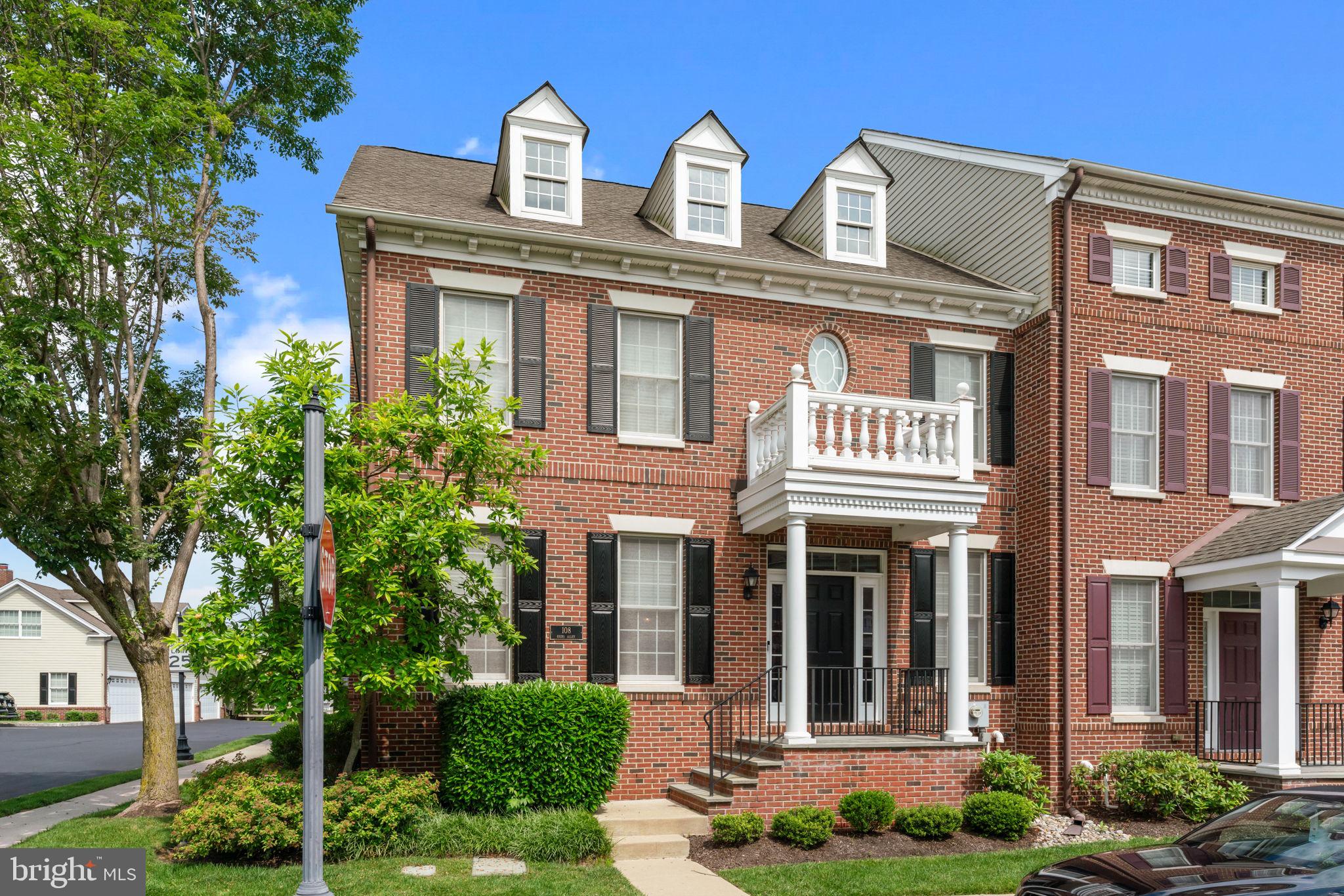 Welcome to this stunning, light-filled brick-front end-unit townhome, perfectly situated in the prestigious and impeccably maintained Newtown Walk community. Just a short stroll from the heart of Historic Newtown Borough—with its charming boutiques, acclaimed restaurants, and vibrant community spirit—this residence offers the ideal blend of luxury, comfort, and convenience.
With the spacious feel of a single-family home, this meticulously cared-for property features 3 bedrooms, 2.5 bathrooms, and a thoughtfully designed layout ideal for both relaxed everyday living and elegant entertaining.
Step inside to discover rich hardwood floors, detailed moldings, recessed lighting, and fresh, neutral paint throughout, creating a timeless and welcoming ambiance. The open-concept living and dining areas offer an ideal setting for hosting gatherings, while the gourmet kitchen is a chef’s dream—complete with 42” cabinetry, granite countertops, a stylish tile backsplash, stainless steel appliances, and a built-in refreshment center with additional storage.
The inviting family room, anchored by a cozy gas fireplace, opens through sliding glass doors to a private, maintenance-free composite deck—perfect for outdoor dining or quiet mornings with coffee.
Upstairs, the spacious primary suite impresses with a soaring cathedral ceiling, a luxurious en-suite bath with dual vanities, a deep soaking tub, and an oversized shower. Two additional well-sized bedrooms share a full hall bath with double sinks. A convenient first-floor laundry room adds everyday ease.
The finished lower level expands your living space with a large recreation area featuring a tray ceiling, second fireplace, and French doors leading to a versatile bonus room—ideal as a home office, gym, or guest space. Luxury engineered wood flooring and ample storage complete this level. A two-car garage adds to the convenience.
Nestled beside scenic Roberts Ridge Park, enjoy direct access to 22.8 acres of outdoor space, including walking trails, an inclusive playground, and picnic areas. The nearby Newtown Trail connects you to Silver Lake Park, Chandler Fields, Tyler State Park, and the cultural treasures of Newtown Borough.
With easy access to major routes and regional trains, commuting to Philadelphia, Princeton, or New York is effortless. Just 20 minutes to Mercer Airport, this exceptional home offers unmatched lifestyle and location.