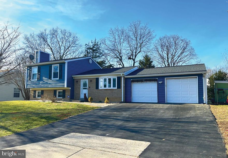 Welcome to this well-maintained split-level home, boasting 1,848 Sq ft of comfortable living space and the added advantage of no HOA fees. This home offers an array of features that make this residence both inviting and practical. The main level welcomes you with a radiant living room with hardwood floors, providing a warm and elegant ambiance. The kitchen has ample space, with newer cabinets and kitchen appliances and a separate dining area. Additionally, there is a spacious 16x16 family room rear addition off the kitchen with a skylight, ideal for family gatherings. 
The upper level offers a serene master bedroom complete with a full bathroom, along with two additional bedrooms and another hall full bathroom, ensuring privacy and comfort for all occupants.
The lower level is a bright and welcoming space, featuring a recreational room with a fireplace, perfect for cozy nights in. Additionally, this level hosts a laundry area and a convenient half-bathroom.  The rear deck offers a tranquil outdoor retreat for relaxation or entertainment. The large driveway can accommodate up to 4 cars plus the attached two-car garage not only adds to the convenience but also ensures sheltered parking and easy access to your home, rain or shine. Conveniently located near shopping and restaurants. Easy access to Shady Grove Rd & I-200 and other major routes and proximity to downtown Gaithersburg. Don’t let this opportunity slip through your fingers – make this beautiful home your own today