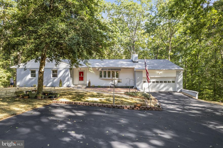 Spacious 5-bedroom, 3-bath home located in a quiet neighborhood. The main level features an open layout with a functional kitchen, stainless steel appliances, and a dining area that leads into a bright sunroom with access to both the garage and dining room.

The finished basement includes two additional bedrooms, a large bonus room, and a built-in bar area. There are two wood-burning fireplaces, one on each level, providing comfortable gathering spaces. All three bathrooms have been updated.

Step outside to a large back deck overlooking the yard — a great space for relaxing or entertaining. Exterior updates include fresh paint , front yard sprinkler system and a newer garage door. Additional features include a 2-car garage, updated HVAC, and energy-efficient windows.

This home offers plenty of space and flexible living options for families, guests, or home office needs.