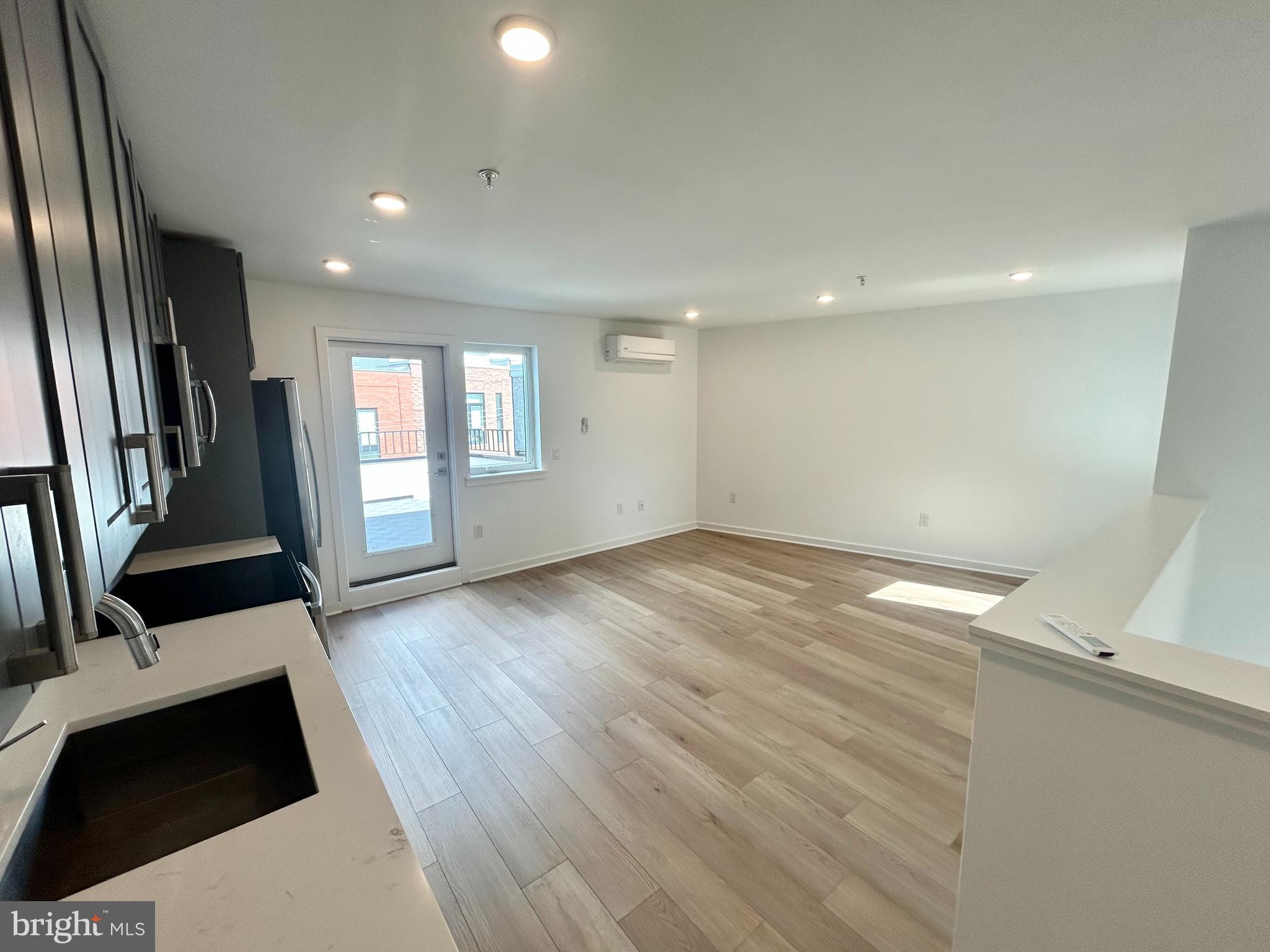 Live at 5703 N 16th St #2 — a bright and spacious 2-bedroom, 1-bath unit located in the Olney section of Philadelphia. This top-floor apartment features large bedrooms, a generous kitchen with a stove and refrigerator included, and a bathroom with both a separate stand-up shower and full tub. Available immediately — schedule your showing today!
