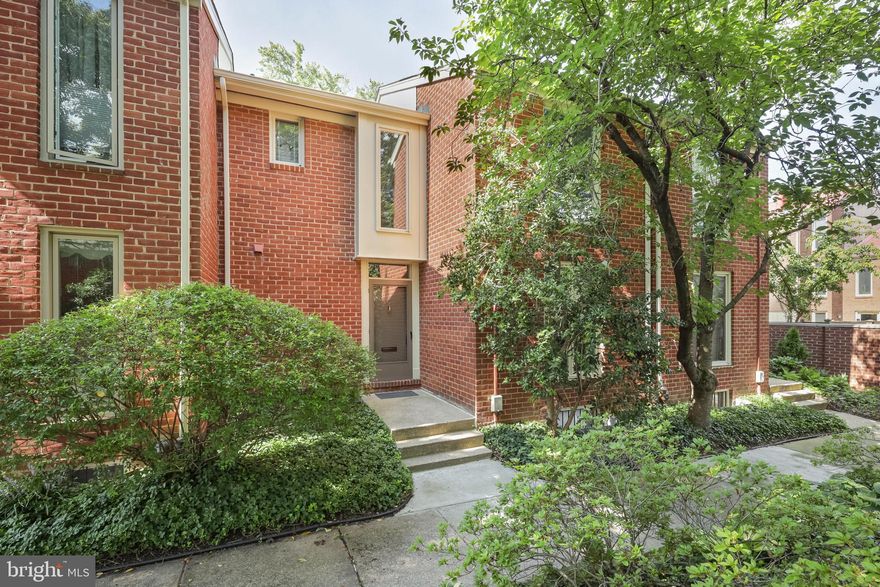 Coveted contemporary townhouse on the park-like Linden Green, a non-thru, gated street with a mature tree canopy, public art, and water features. 1308 Linden Green is a light-filled home with a large living room and dining room with a wood-burning fireplace, den, newly renovated kitchen, and half bath on the main level. The second floor has three bedrooms, 2 baths, ample closets. The lower level is unfinished but can easily be finished with a fourth bedroom, full bath, and utility room. This home has one of the largest outdoor spaces in the community. One car is assigned parking along with a second space for guests.