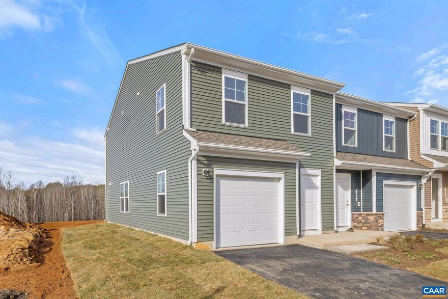 Brand-new end unit townhome with modern finishes and an open, light-filled layout. The main level features a stylish kitchen with quartz countertops, stainless steel appliances, and a large island overlooking the living area. Upstairs offers spacious bedrooms, a bright primary suite, and convenient laundry. Attached garage, driveway parking, and low-maintenance living in a growing neighborhood with scenic views.  Minutes off Rt. 29, Lowes, Walmart, and NGIC.  Licensed realtor is part owner in the property.