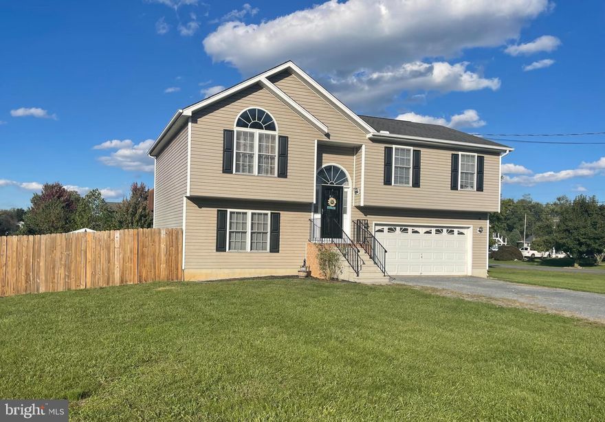 This well-maintained property offers 3 bedrooms and 2.5 bathrooms, providing ample space for comfortable living. The main living areas features an open floor plan, allowing for a seamless flow between the living room, dining area, and kitchen. The kitchen is equipped with modern appliances, plenty of storage space, and a breakfast bar, making it a delight for both cooking enthusiasts and busy families. The primary bedroom includes a full bathroom,  providing a private retreat after a long day. The additional bedrooms are generously sized. The family room on lower level provides additional living space and conveniently walks out onto the backyard patio. Outside, the property sits on a large corner lot with a fenced-in backyard that offers privacy and a secure space for outdoor activities. The outdoor area includes a shed, above ground swimming pool, a patio and a deck-perfect for entertaining or relaxing. This home is complete with a 2-car garage. Located in Inwood, WV, this home provides convenient access to a range of amenities. Shopping centers, restaurants, and recreational facilities are all within close proximity, ensuring you have everything you need just moments away. All sizes are approximate.