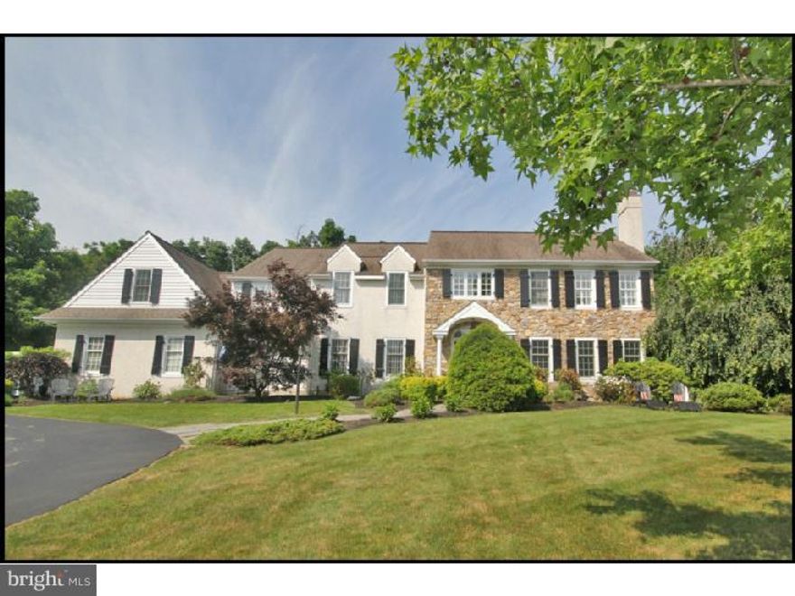 Beautiful classic stone and stucco home on lovely piece of land with large flat rear yard, in-ground swimming pool and outdoor kitchen in a wonderful family friendly neighborhood in the terrific Tredyffrin/Easttown School District. This home has been lovingly updated and maintained. Enter tile entry way and to the right find intimate LR with gas FP. To the left find a large accommodating DR. Throughout the home you will find designer/decorator colors and finishes. Follow the center hall back to find a large cathedral ceiling FR with built-ins and a wet bar. A large spacious office with built-ins is found in the back right of the house. The kitchen has been updated with very nice granite and stainless appliances. Off the kitchen you will find a large mudroom with the former laundry hook ups which could be set up again. (The family's laundry is found on the second floor where they converted what was a 6th 2nd floor bedroom into a laundry area.) Home has hardwoods throughout, a front and back staircase, wonderful flow, and plenty of space for family days as well as entertaining. Upstairs find 5 bedrooms, all of great sizes, all with California Closet built-ins. The master bedroom suite is very large, with an exceptional walk-in closet and redone master bath with custom vanity with granite countetops and large frameless shower. One bedroom has on-suite bathroom in a very "Lily" theme. Other family bedrooms (one with a Tiffany-vibe) are serviced by an updated fresh and current hall bathroom. The lower level is spectacular, with work-out area, media area, bar area and complete bedroom suite with full bathroom. There is plenty of unfinished storage area and there is another laundry hook up for the au-pair or nanny's use. This laundry area is also convenient for pool items as there are walk-up stairs from the lower level to the pool area. The rear yard has space for everything. There is a large stamped concrete patio with full kitchen. The pool is spectacular, and long enough for swimming laps. This 1.1 acre lot still has plenty of room for a game of soccer or otherwise. Welcome lucky buyer!