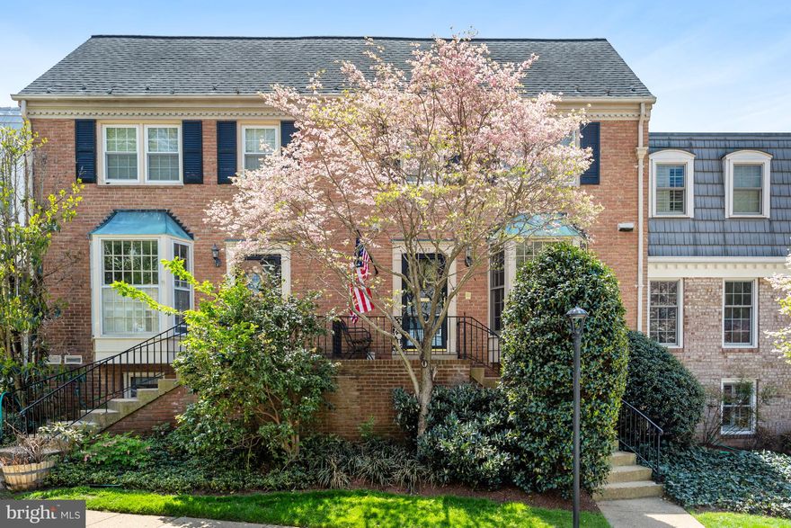Move-in ready and full of charm, this all-brick townhouse is nestled in the sought-after Kings Manor neighborhood. Located on Baron Road—one of the few streets offering both front and rear parking—this home combines timeless style with modern convenience.

Step inside to a welcoming foyer with immediate access to a beautifully updated powder room. The renovated kitchen is both stylish and functional, featuring stainless steel appliances, updated cabinetry and countertops, soft-close drawers, and an impressive coffee/wine bar with full-extension drawers and additional storage. A bay window provides space for a kitchen table, and the open layout seamlessly flows into the dining and family room—ideal for both everyday living and entertaining.

The inviting family room showcases a cozy fireplace and custom built-ins, creating a warm, relaxed atmosphere.

Upstairs, you’ll find three generously sized bedrooms and two updated full bathrooms. The primary suite includes two closets and a renovated en-suite bath with a walk-in shower and vanity with storage. The guest rooms are spacious, and one includes built-ins—perfect for a home office. The hall bathroom features a tub/shower combo and updated vanity.

The lower level expands your living space with the fourth bedroom, full bathroom, laundry/utility room, and a well-appointed recreation room complete with a second fireplace, brick surround, built-ins, and access to the private rear patio. The patio offers direct access to parking.

Additional highlights include hardwood floors on the main and upper levels, and durable LVP flooring on the lower level.  

Enjoy all that Kings Manor has to offer—sidewalk-lined streets, a community park, basketball court, and unbeatable access to Route 123, downtown McLean, Tysons, and Washington, DC.