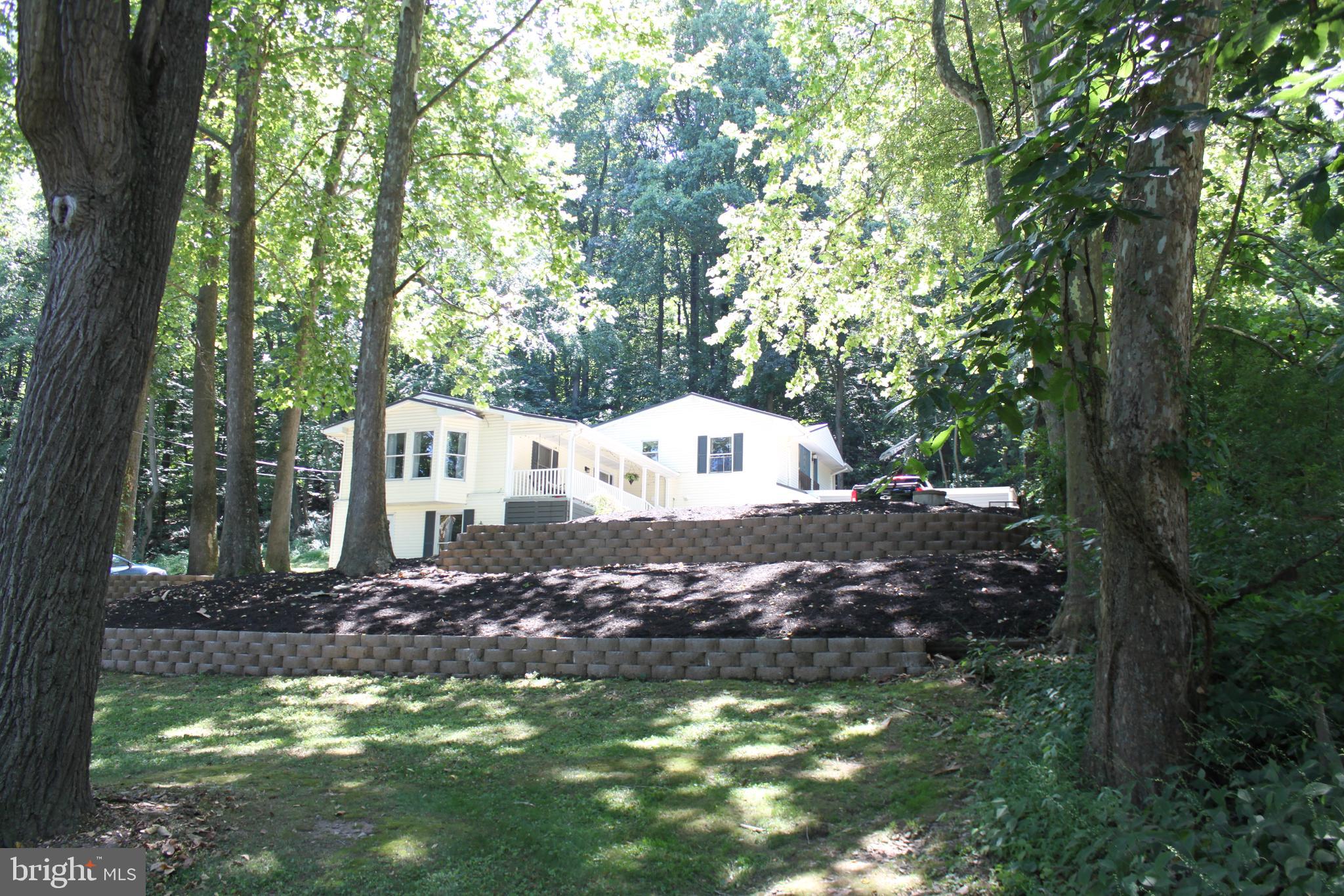 Just Wow! If you're looking for a home that feels like a private retreat in the wood, look no further. This spacious split-level offers 4 bedrooms and 4 bathrooms, giving you the space and comfort you’ve been searching for. All the work has been done for you, Updated windows along, with sliding glass doors, and New metal roof.
Love working on your own projects? The 4-car tandem garage is perfect for anyone who enjoys doing their own maintenance or needs extra storage.
Inside, you’ll find an amazing open layout that seamlessly connects the living, dining, and kitchen areas—ideal for entertaining or hosting large family gatherings. The newly updated kitchen is absolutely stunning and sure to leave you speechless.
Additional highlights include dual-zone heating and air conditioning, and a location that’s just minutes from I-83, the PA Turnpike, and nearby amenities.
Schedule your showing today, This is one you won't want to miss!