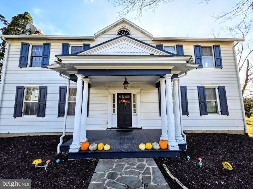 This exquisite 3,000SF Colonial home on 8.1 acres, built in The "Golden Age" 1940, once home to Rubens Peale with one of his greatest pieces being Still Life with a Watermelon.  Step inside the former "Woodland Farm" to discover rich wood floors that flow throughout the spacious interior, accentuated by a cozy stone fireplace, perfect for intimate gatherings. The home features five generous bedrooms and two full bathrooms one on the main level and 2nd level plus a utility bathroom in the basement. Along with providing ample space for relaxation and privacy throughout the home. An attic offers additional storage or potential for creative use. Outside, the property boasts an impressive 8.1 acres, bordered by serene game land and lush woodlands, ensuring a tranquil retreat. Enjoy the beauty of nature from your patio or porch, or take a dip in the inviting in-ground pool. The landscape is partly wooded, with a gentle stream meandering through, enhancing the peaceful ambiance. With convenient access to the Schuylkill River just 1,000 feet away, outdoor enthusiasts will appreciate the fishing opportunities. The attached garage and ample driveway space provide practical parking solutions. This property is a true sanctuary, perfect for those seeking a harmonious blend of luxury and nature.