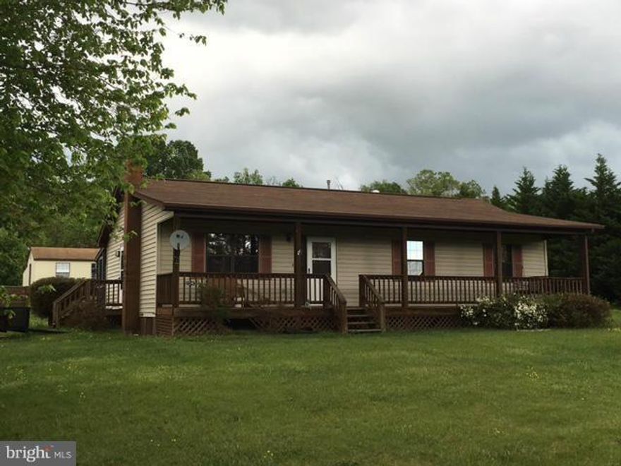Custom Built Rambler, freshly painted interior, new counters in kitchen, new carpet in bedrooms, screened porch on back, nice yard with garden space, shed/workshop with lean too shed.