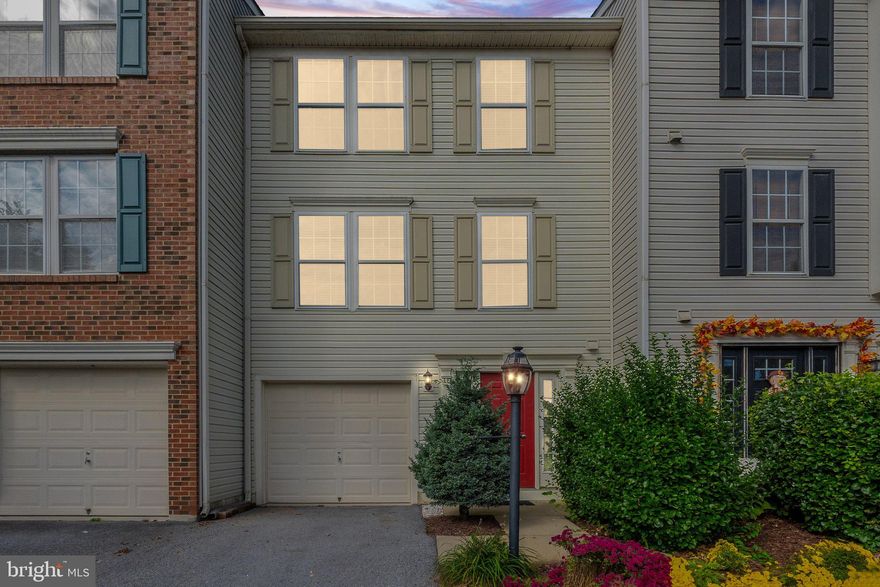 "Back on the market after buyer withdrew during the due diligence period, no fault of the seller!" Welcome to 1329 Steed Street, located in the charming neighborhood of Lakeland Place at Fairfax Crossing. This beautiful townhouse features brand new carpeting throughout and a recently updated water heater (2023), new washer & dryer (2024) & new HVAC (2024).  Step outside to enjoy the spacious deck off the kitchen, a vinyl privacy fence backing to serene trees, and a level lot perfect for relaxation. Inside, you'll appreciate the elegant upgrades, including chair railings and crown molding throughout. The bright foyer leads to a welcoming recreation room with walkout access, a convenient laundry area, and a half bath.

The second floor boasts a large family room and a bright kitchen with ample table space. 

Upstairs, you'll find three bedrooms, including a spacious primary suite with vaulted ceilings, a walk-in closet, and an ensuite bathroom featuring a soaking tub and separate shower.

Wonderfully maintained, this home is ideally situated close to shopping, schools, restaurants, and more, offering both comfort and convenience.