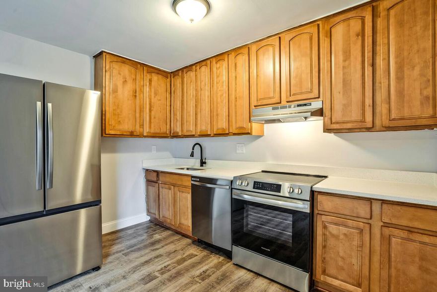 Stunning Remodel Top To Bottom With Matching Laminate Floors Throughout. Quarts Counters, Stainless Appliances, Fresh Paint, New Vanities, New Lights, Switches & Outlets Throughout! This One Will Not Last In This Market Do Not Wait, It Will Be Gone Soon!