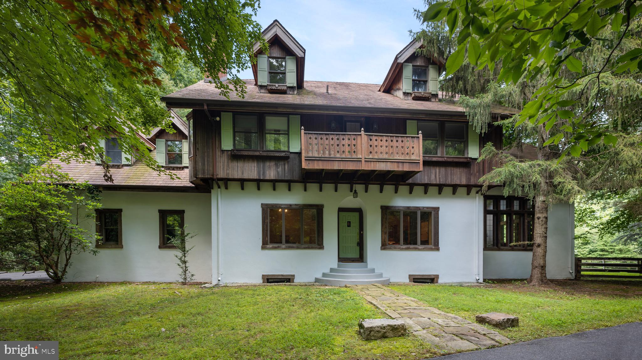 Welcome home to this Custom-Designed Estate located just minutes from the heart of DC! This 7 Bedroom, 4.5 bath home will pleasantly surprise you with Picturesque Views and a Stately Presence. In it you will find beautiful hardwood floors, custom wood work, a formal dining room, a spacious kitchen with granite counters, an island and a sun-filled breakfast room that offers an amazing view of the backyard. It also features a magnificent Great room adorned with a beautiful cathedral ceiling, is lined with windows and centered around a grand wood-burning fireplace- the perfect room for entertaining! On the upper level you will find a fantastic Primary Suite with its own beautiful fireplace and a window seat for reading and relaxing plus an amazing Primary Bath with 2 walk-in closets, marble floors, onyx vanities, a soaking tub and oversized stall shower. There are also 3 additional spacious bedrooms and 2 full jack/jill baths. The top level offers 3 more additional bedrooms plus 1 more full bath- great space for In-Laws or an Au Pair. On the lower level, the possibilities are endless! This unfinished space offers laundry, is roughed in for a bathroom, walks up to the backyard and offers plenty of space to make your own. And if you enjoy the outdoors, then look no further! This home is situated on a fantastic lot with over 2 acres of tranquil trees that you may enjoy from either the back deck or the peaceful patio. Don't miss out on all this Beautiful home has to offer- schedule your appointment today!