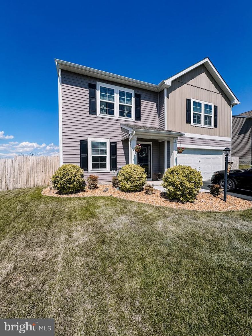 This 4 bedroom 2.5 bath Colonial is nestled in a cul-de-sac with breathtaking mountain views in the sought after neighborhood of Morning Dove Estates. Walk into a welcoming family room that opens up to the bright kitchen featuring stainless steel appliances, an expansive kitchen island,  granite countertops and a pantry for added storage. From the dining area, you can walk out onto a patio made to entertain with an outdoor bar, fenced in backyard with a view, and an extra storage shed. The paneled accent wall in the main floor office adds a touch of sophistication to this home.  The luxury vinyl plank flooring is continued in the upstairs hallway into the Owner's Suite where you will find a connected bath with walk in shower, double vanity, and spacious walk-in closet.  Three other bedrooms, a full bath, and separate laundry room can be found on this upper level. The two car garage offers access into the kitchen, adding an extra level of daily convenience for when you can call this home yours.