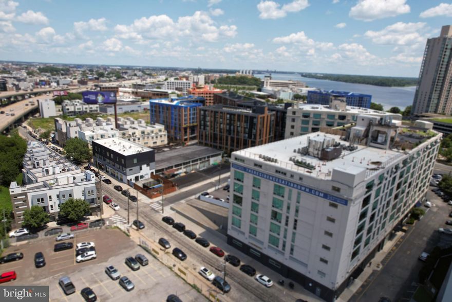 Immaculate 3BD/3BA Townhome with Garage in Northern Liberties! Welcome to this beautifully maintained townhome offering 3 bedrooms, 3 full bathrooms, a private garage, and multiple outdoor spaces — all in the heart of Northern Liberties. This home combines modern finishes with functional design for effortless city living. The first floor features a spacious bedroom with hardwood floors, recessed lighting, a large closet, and a full en-suite bathroom. Step outside to a fully fenced private patio, perfect for entertaining or relaxing. On the second floor, enjoy an open-concept living and dining space centered around a gourmet kitchen with custom cabinetry, quartz countertops, stainless steel appliances, a tiled backsplash, and a large island with seating. Glass doors lead to a rear deck, ideal for grilling or outdoor dining, while the front balcony allows fresh air to flow throughout the space. Upstairs, you’ll find two generously sized bedrooms, a full hall bath, and a convenient laundry closet. The top-level owner’s suite includes a luxurious en-suite bath and ample closet space. Access the private rooftop deck with city views — perfect for entertaining or relaxing under the stars. The fully finished basement adds flexible living space ideal for a home gym, office, or media room. Additional highlights include hardwood and tile flooring throughout, central AC and heating, and recessed lighting. Located within walking distance to top restaurants, cafes, shops, and just minutes from I-76, I-95, the Market-Frankford Line, and Philadelphia International Airport. This home truly has it all — space, style, convenience, and location!