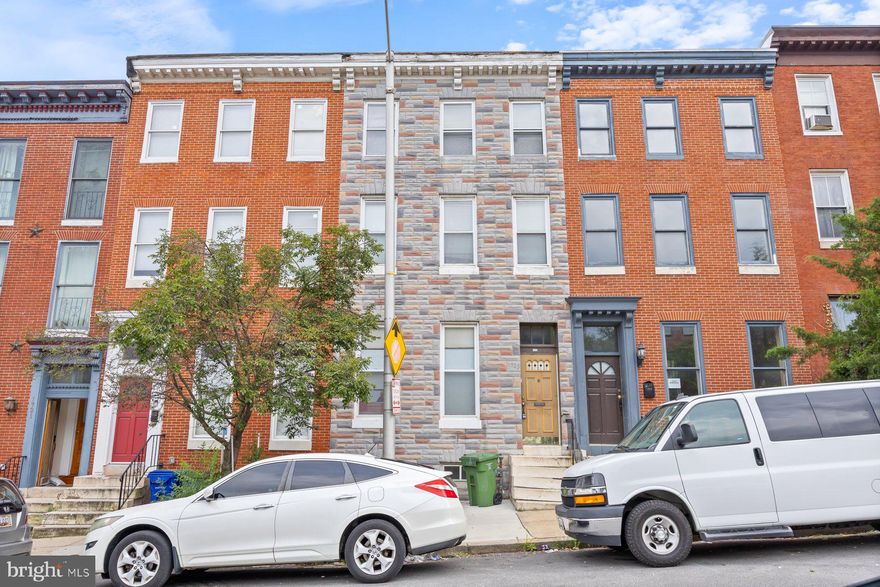1725 Hollins St offers the possibility of a four unit home. Currently it has four separate one bedroom apartments all with a kitchen and bathroom. There is currently only one water heater for all units. Come with your ideas to update. Being sold as is and all items in the house convey.