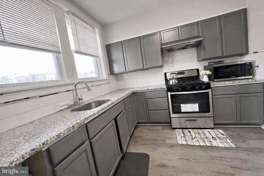 This charming interior row townhouse, offers a perfect blend of classic character and modern convenience. With 1,140 square feet of thoughtfully designed living space, this home is ideal for those seeking comfort and style in a vibrant Philadelphia neighborhood. Step inside to discover a warm and inviting atmosphere, enhanced by the recent renovations that have revitalized the entire space. The open layout seamlessly connects the living and dining areas, creating an ideal setting for both relaxation and entertaining. The durable vinyl flooring throughout adds a contemporary touch while ensuring easy maintenance. The kitchen, a focal point of the home, is ready for your culinary adventures. Its efficient design allows for easy movement and functionality, making meal preparation a delight. This home features three cozy bedrooms, each offering a peaceful retreat at the end of the day. The full bathroom has been updated to provide a fresh and modern feel, ensuring comfort for all who reside here. The unfinished basement presents a blank canvas for your imagination-whether you envision a home gym, a playroom, or additional storage space, the possibilities are endless. Parking is a breeze with an attached garage, providing convenience and security for your vehicle. The small lot size means less yard work and more time to enjoy the local amenities and community. Located in a vibrant Philadelphia neighborhood, this home is just a short distance from parks, shops, and dining options, making it easy to enjoy the best of city living. With its blend of historic charm and modern updates, this townhouse is not just a house; it's a place to create lasting memories. Don't miss the opportunity to make this inviting space your new home!