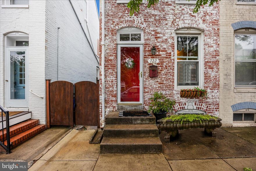 Pro Photos coming! Full of charm and warmth, this early 1900s semi-detached row home offers timeless character just blocks from the heart of downtown Frederick—outside the historic district but close enough to enjoy all the shops, restaurants, and energy.
From the moment you step through the front door, this home feels inviting, with beautiful hardwood floors, warm décor, and custom carpentry details throughout that give it a truly special feel. The main level blends classic charm with thoughtful updates, including a beautifully updated kitchen with space for a full dining table, a separate dining room with electric fireplace for added warmth and ambiance, the convenience of main-level laundry, and a full bath on the main level.
Upstairs, you’ll find comfortable bedroom spaces along with a second full bath on the bedroom level, including a primary bedroom with tray ceiling and a rear bedroom featuring a private balcony overlooking the backyard—a perfect spot to unwind.
The finished lower level adds a cozy rec room along with valuable storage space, while the finished third-floor attic offers even more flexibility as a den, guest room, or lounge area.
Step outside to enjoy a beautifully designed backyard complete with a patio, charming brick walkway, and landscaped, fully fenced yard that leads to a nice sized storage shed and off-street parking—a rare find in this location.
Character, comfort, and convenience come together in this inviting downtown home—perfect for those who appreciate charm and want to be close to it all.