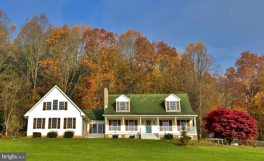 This is the most amazing property!  Spectacular view from the expansive front porch.  Amazing spaces inside and out.  From the moment you drive up the road, this place stands out.  This one has everything you have been looking for in your next home!

Beautifully designed, Cape Cod, nestled on almost 5 acres, surrounded by farm fields and a Christmas tree farm.  From the soaring ceilings to the large windows, the outside seems to be part of the inside.   Fantastic layout!  Entering from the front porch you step into the open floor plan and the dining room, with its large windows that let the natural light fill the room. The dining room also boasts lovely floors, a ceiling fan and a lovely wood stove with a mantle.  The kitchen has been well thought out.  A big window over the large kitchen sink that overlooks the back yard and pool.  Kitchen features quartz countertops, an expansive island with butcher block, an outstanding coffee bar area and table space too.  Big sliding glass doors lead out back to the patio.  Stainless Steel appliances, gas oven and plenty of storage, especially with the huge pantry.  The GREAT room is next with the soring ceiling, recessed lighting, skylights, ten windows, pellet stove and a magnificent stairway up to the loft game room. This game room is really cool!  Awesome wet bar, recessed lighting, sky light and space for a pool table or ping pong.  Door has been installed for a future deck. Back down on the main level is the door to the oversized two car garage, a powder room, laundry room, and a mudroom that leads out to the back yard.  Main floor owner’s suite!  Great size bedroom with several big windows and a walk-in closet.  The bedroom is lovely but the bathroom is spectacular.  Double vanity, heated floors, huge open shower with rainhead, and a soaking tub.  True oasis after a long day.

Going upstairs you will find two more bedrooms with great closets and even extra hidden storage spaces.  Another space upstairs for an office area or maybe a homeschooling spot.  The bathroom is large and updated with a shower/tub.

The lower level, finished and has a half bath that can be converted to a full bath!  Also, two storage areas, one just for the pool supplies.  Outside access with stairs from the lower level that lead to the garage.  
Back outside the lucky new owners will have an entertaining dream!  Great patio complete with a pergola and kitchen area.  During those summer months enjoy the inground pool and patio areas surrounding.  Even the view from the pool is stellar!

Finally, bring your horses too!  Barn, four pastures with 5 strand coated wire fencing, automatic waterer, two grooming areas, plus a full dressage arena and round pen.  Awesome tack house with electric too!  Check out associated docs for more horse features.

All appliances convey, even the extra fridge in garage and a one-year home warranty too!

Outstanding location, just minutes to the MD/PA line. Great for commuting South to Hunt Valley and Baltimore or North to York and Harrisburg. 

One of those properties that just does not come on the market very often.  Start your New Year off in one of a kind home!  Please check out all the pictures and then you MUST come see for yourself. Make your appointment for a private showing.