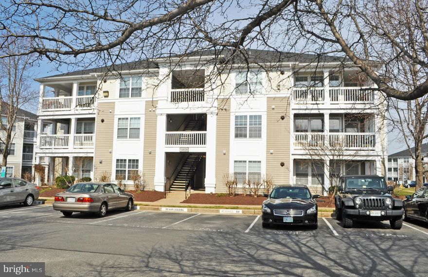 Gorgeous ground floor condo.  Home was completely renovated less than a year ago; granite in kitchen and baths; ceramic; gorgeous wood floors throughout; crown molding; custom paint; updated fixtures; gas fp.  Home is immaculate and move-in ready! Amenities include pools, exercise room, tennis courts & tot lots.  Great location close to schools, shopping and commuter routes. DON'T MISS THIS ONE!