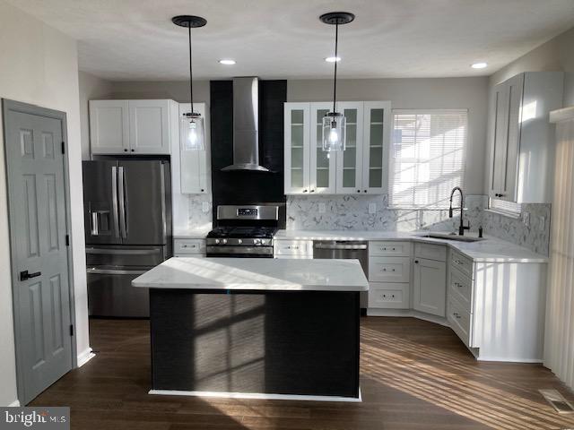 Very nice house is ready for new owners. Freshly painted with new flooring on all levels. Lower level with wet bar and clubroom with fireplace insert . Main level with high ceiling. Kitchen recently updated with modern white cabinets, quartz countertop and stainless-steel appliances.
