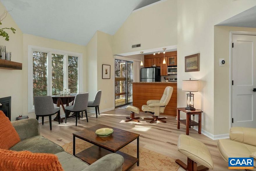 Outstanding condition and location! This 2 bedroom updated condo is located at the end of a quiet cul de sac overlooking open space, with just a few steps to the entry. Rare end unit with a bonus space for extra storage, office or playroom. Recent improvements include flooring, interior doors, HVAC (2024), and a deck which has just been completed. Kitchen with cherry cabinets, granite counters and stainless appliances. Ready to welcome a new owner wanting the convenience of this central location, but a quiet space overlooking the wooded area. Laurelwood is the only association with its own outdoor pool.,Cherry Cabinets,Granite Counter