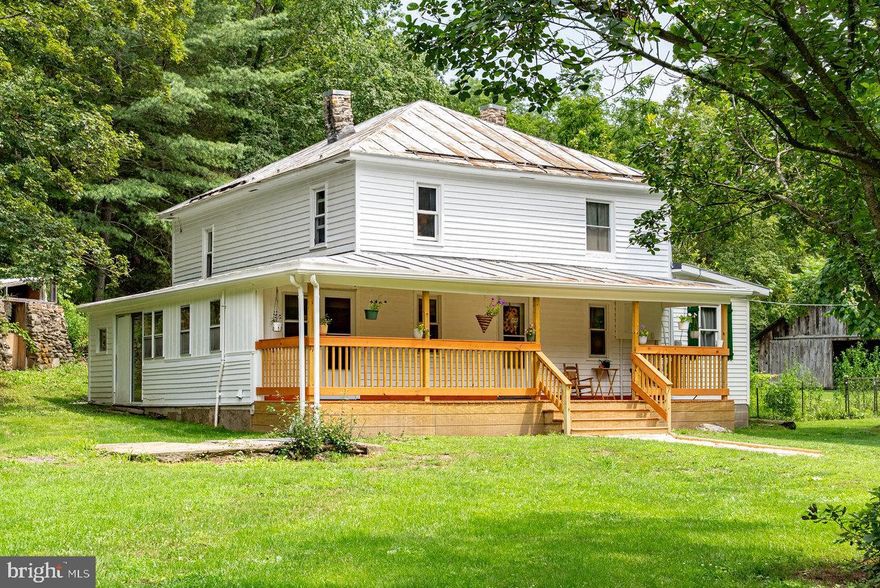 HOMESTEADERS and SEEKERS OF PRIVACY, here is your little slice of heaven! Lovely home with many updates and upgrades on nearly 5.5 acres! Bring the family and all of the animals with you! Plenty of indoor and outdoor space for all! Home has beautiful custom woodwork in upstairs bedrooms. Hardwood floors (even under vinyl), various heat sources including propane inserts, propane logs, and outdoor wood furnace (hydronic baseboard). Most of the plumbing, electrical, and windows have been updated. Character and charm in every room. Outdoors, enjoy a beautiful front porch, a quiet back porch, and ample space to run and roam. An assortment of edible delights are growing on this property including peach, apple, pear, blackberries, strawberries, and walnuts. Outdoor buildings include a barn, storage sheds, huge 20x40 garage/shop (improved 2018), root cellar, chicken coop, spring house, and more! Storage and animal shelter is no problem! Lots of great garden space for the gardener! Nearly level open acreage with some slightly elevated wooded area. Fabulous location in beautiful Pendleton County near National Forest, Camp Run Lake, and a short scenic drive to Bergton, VA across Cow Knob. Less than 30 mins to Moorefield and to Franklin. Don't miss the opportunity to make this one your perfect home-place!