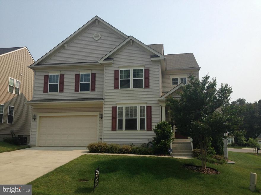 30K reduction!! Colonial with all the bells and whistles. FRML LR and DR, Grand KT with 42" maple cabs,SS appliances, and granite. Upgraded hardwood throughout main level.  MSTR BDR on second floor w/ HRDWD. 3 add/ BDRS up, 1 with private BTH. Fully finished lower lvl w/FR, full BR, full BTH, and plenty of storage.  New deck off rear of home in last year. Check SQ FT.  Much larger than it looks.