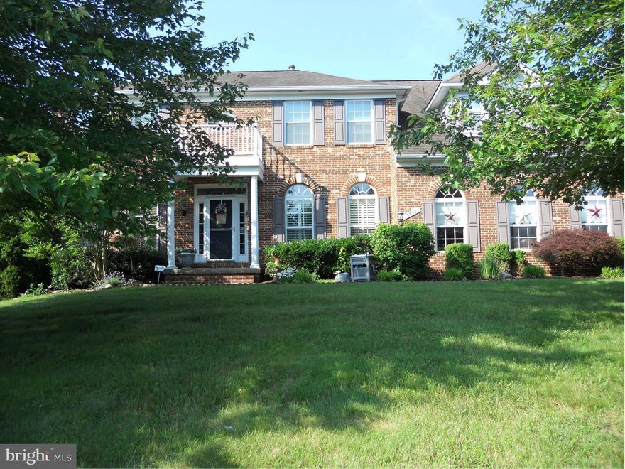 Stunning 4 BDR 3.5 BA Brick Front Colonial.  Move in now and enjoy the pool this summer! Kitchen w/Granite counters, tile flooring, Upper Level and Main Level Baths upgraded, upgraded carpeting, Hardwood in LR, DR, FR, Hallway, Stairs & upper Hall. Wood Burning FP. New garages doors, upgraded fixtures. Crown molding & chair railing. Enjoy entertaining outdoors w/ multiple decks, patio and pool.