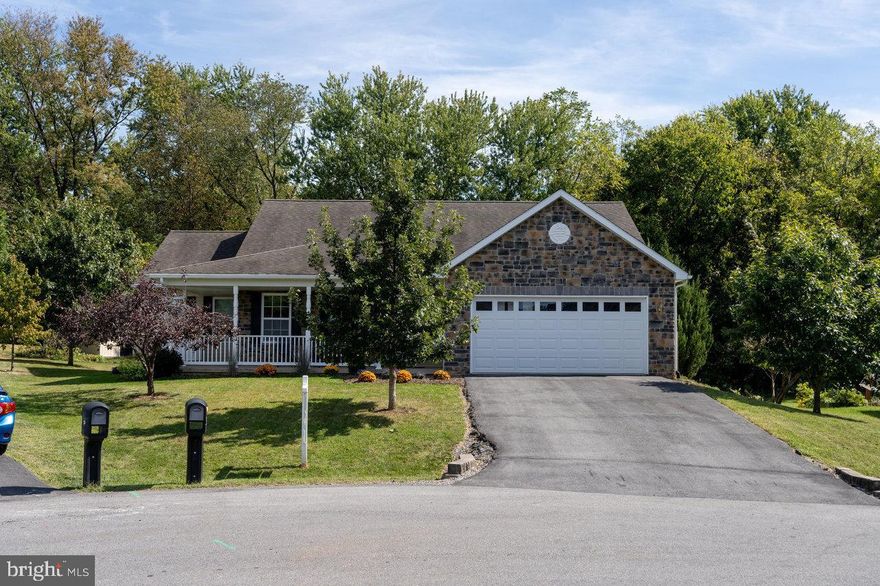 Discover the charm of this beautifully designed ranch-style home nestled in the serene Pebble Ridge community. With 1,669 sq. ft. of thoughtfully laid-out space, this residence features three spacious bedrooms and two full bathrooms, including a luxurious primary suite with a soaking tub and walk-in shower. The open floor plan seamlessly connects the inviting dining area and kitchen, complete with an island perfect for gatherings. Enjoy the warmth of hardwood floors throughout, complemented by cozy carpet in the bedrooms. The main floor laundry adds convenience to your daily routine. Outside, the 0.3-acre lot offers a peaceful retreat, with 16x20 deck backing to trees and featuring a landscaped front yard in a quiet cul-de-sac. With an attached garage and ample driveway space, parking is a breeze. This home is not just a place to live; it's a sanctuary where comfort meets functionality. Embrace the lifestyle you've been dreaming of!