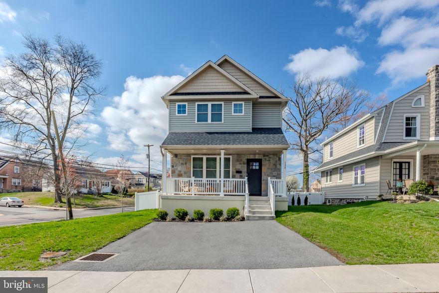 What a rare opportunity in Springfield Township!  This custom built 4 bed 2.5 bath home offers close to 3500 above grade living space as well as a large finished lower level, so all in, it’s close to 4,000 square feet!  This custom home was built by Juliano in 2022 and you will be blown away by the quality craftsmanship, high end finishes throughout, the large open space and how naturally sunlit the home is, set on a large corner lot!  This home offers the best of everything!  Enjoy all of today’s amenities such as 1st floor laundry, a stunning high end kitchen, so much storage space throughout and the charm of being in the heart of Springfield!  Enjoy a 2 minute walk to wawa, restaurants, shops, the park and the train!  Pull into the large private driveway and head on in!  The first floor will truly blow you away!  You walk in and won’t believe how open and spacious the floorplan is.  The large living room has room for tons of larger furniture, has a bay window and gleaming hardwood floors.  The open concept of the kitchen, dining room and breakfast room makes entertaining so easy.  Wait until you see this kitchen in person! It’s beyond gorgeous!  White shaker cabinets, a large center island with cabinets and seating, custom hood, custom tilework include a focal wall at the gas range, quartz countertops and beautiful lighting.  The slider door off the first floor leads to the large and fully fenced backyard- new white vinyl fencing!  Enjoy a perfectly tucked away powder room on the first floor and a laundry room- how could you not love laundry on the main level?  The 2nd floor has an incredible primary suite with tons of closet space and a large bathroom with glass surround shower, beautiful tilework and double vanity.  The 3 additional bedrooms are large with great natural light and the hall bath is also gorgeous.  The lower level offers the ultimate versatility- a large rec room space, added office space, a large playroom, guest space, you name it!  The utilities are in a separate room for convenience and there is tons of storage space down there as well!  This is a home you have to see and feel to believe it- it’s that good!  It’s truly one of a kind and a great value.  Everything is just 3 years old and only an out of state move could take the current owners away.  They have adored every moment of this home and its amazing location.